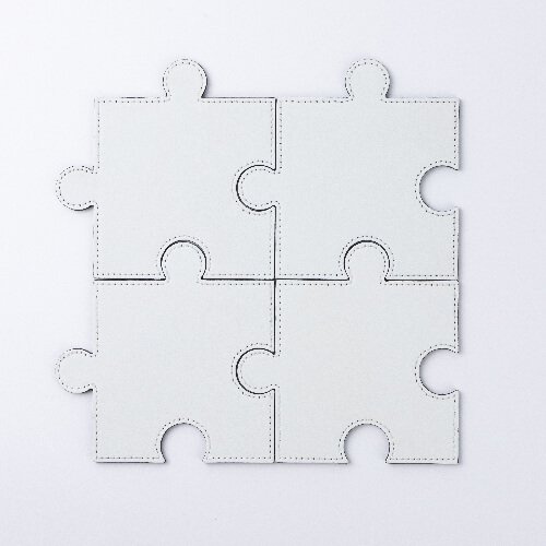 Skórzana podkładka pod kubek w kształcie puzzla do sublimacji - biała