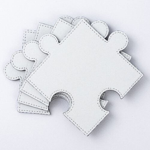 Skórzana podkładka pod kubek w kształcie puzzla do sublimacji - biała